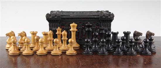 A Staunton ebony and boxwood chess set by Jaques of London, in carton pierre casket, (a.f.).